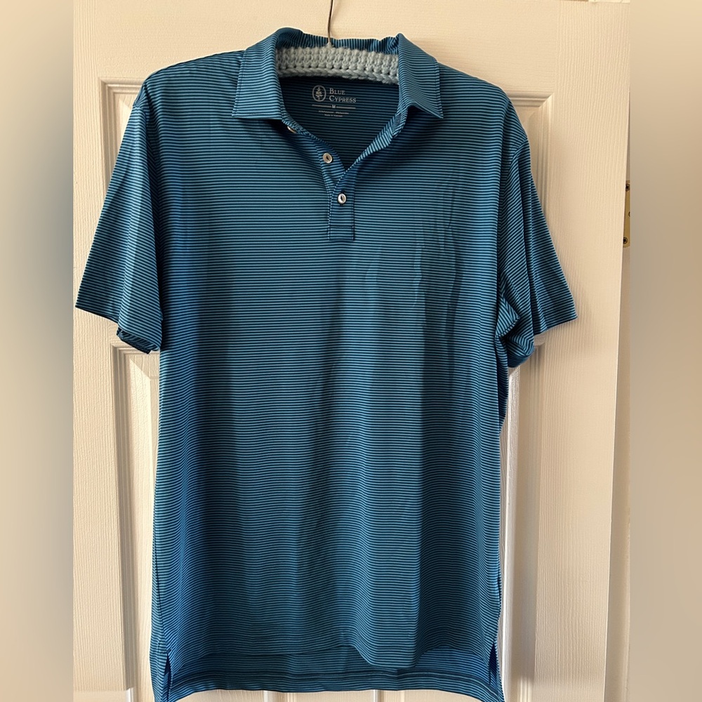 Brand new - Blue cypress golf polo. NWOT men’s medium, blue stripe